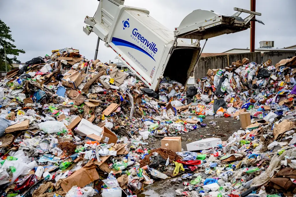 15 Compelling Reasons Why Frozen Foods Are Gaining Popularity Worldwide 6 a garbage dumpster in a pile of trash