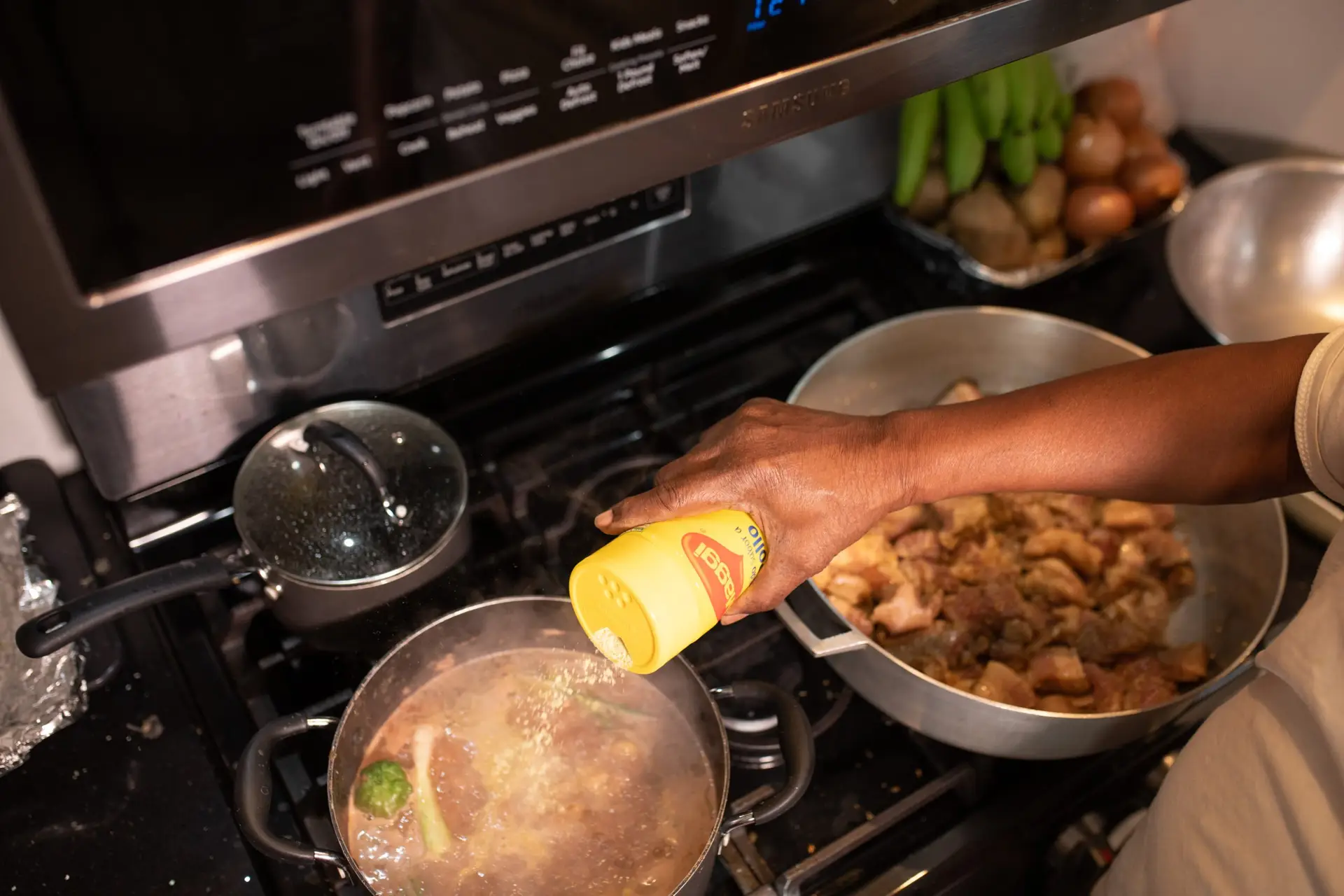 15 Compelling Reasons Why Frozen Foods Are Gaining Popularity Worldwide 10 a person pouring seasoning into a pot of food