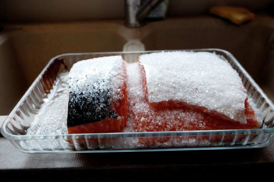 15 Compelling Reasons Why Frozen Foods Are Gaining Popularity Worldwide 4 a piece of meat with salt in a glass container